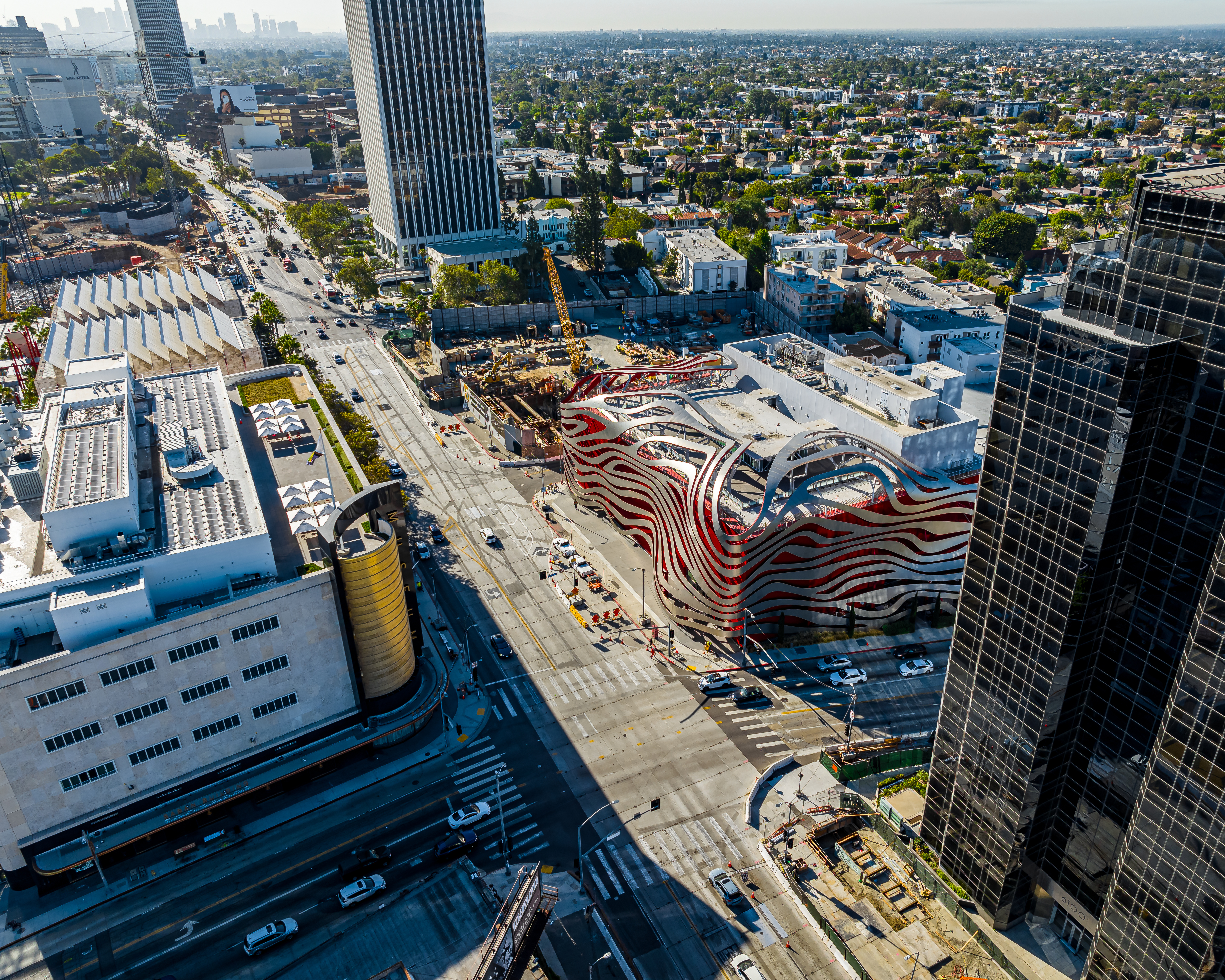 An aerial view of a city street with musuems