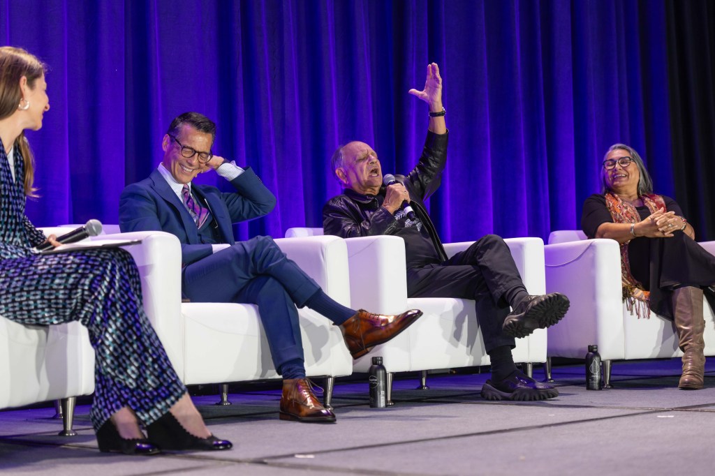 Panelists from the AAM 2025 Keynote engage on stage. Cheech Marin exclaims with his hand raised while others chuckle.
