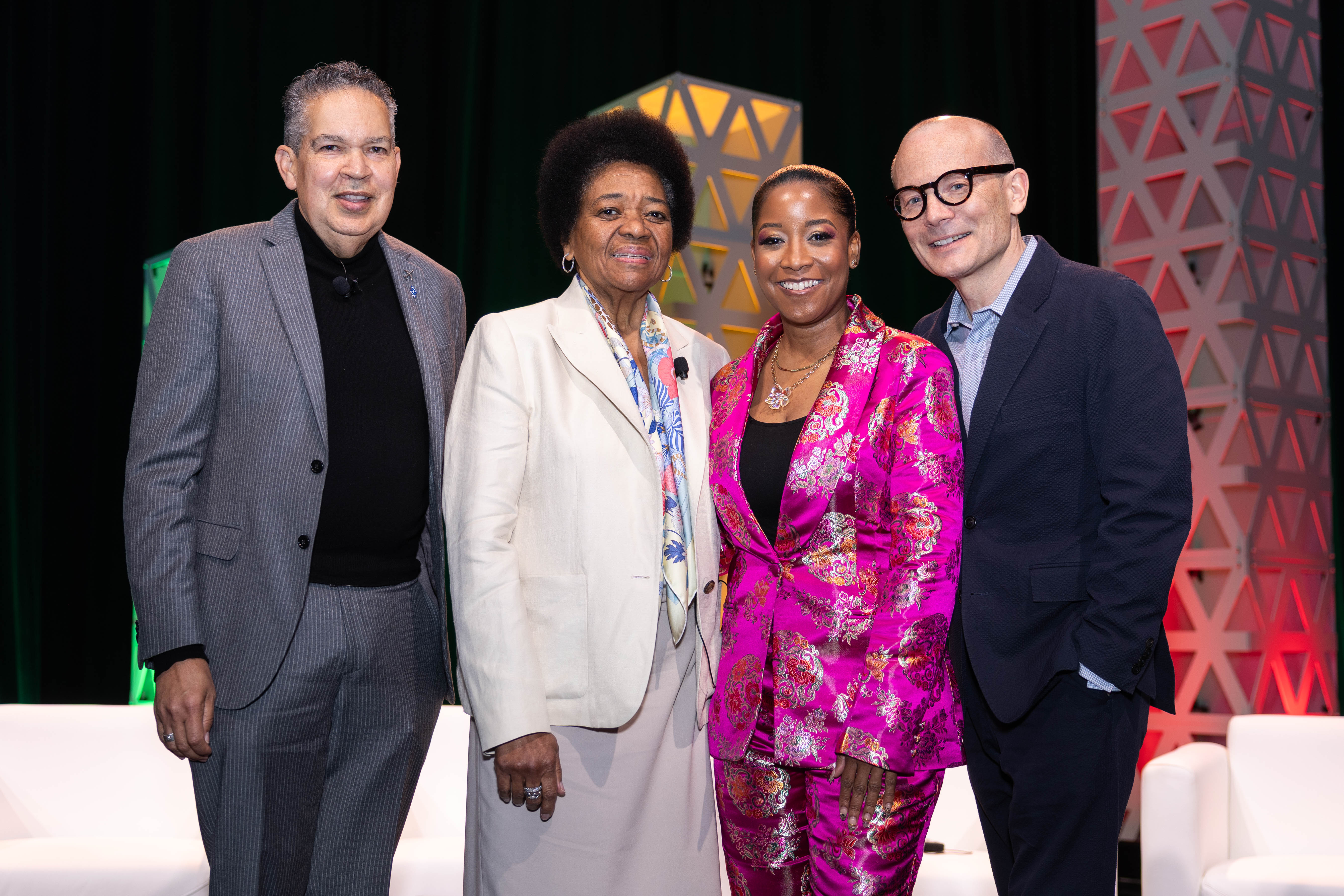 They keynote speakers, Charisse Lillie, Thom Collins, William Harris, and Ashley Jordan pose for a photo