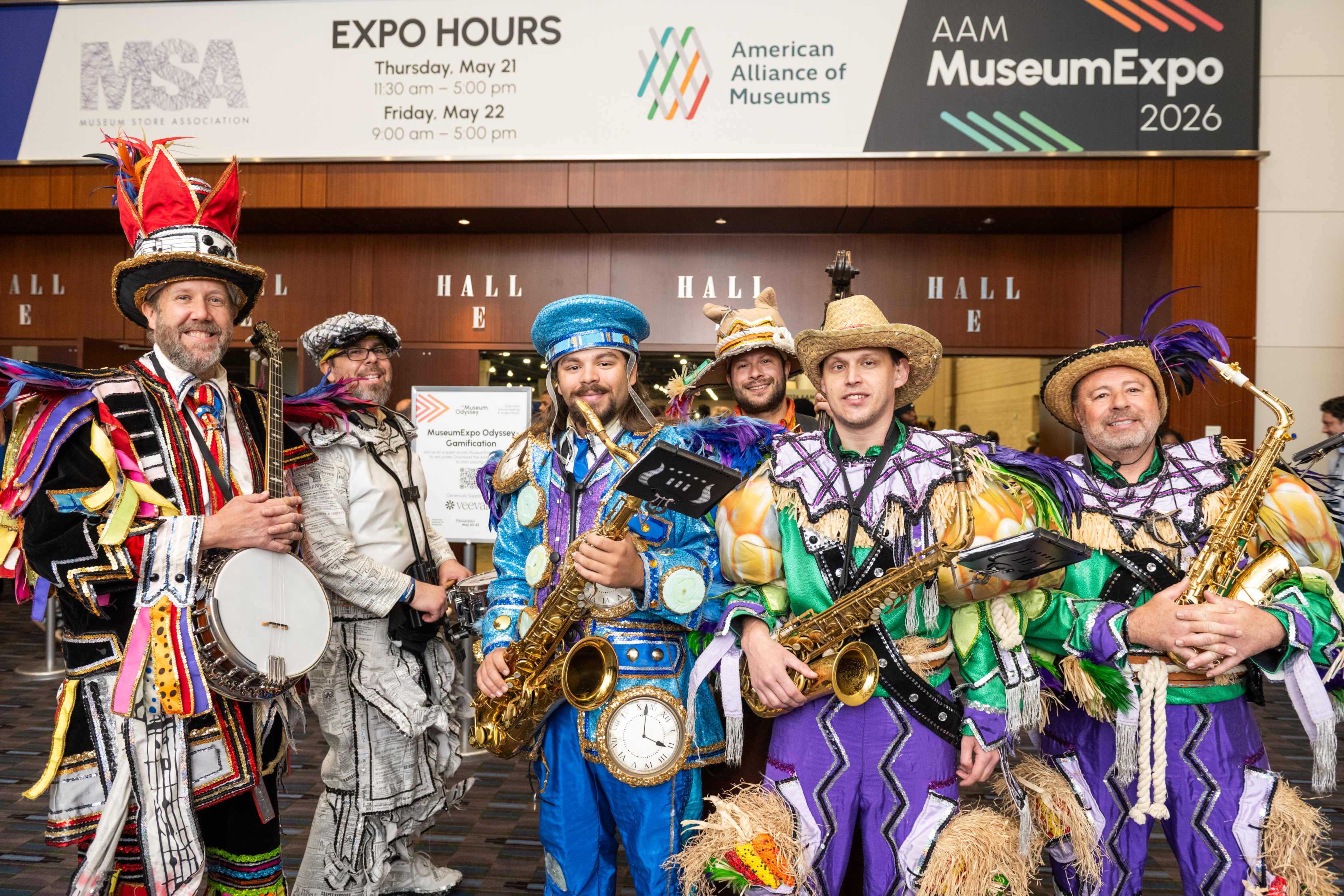 A group of Mummers in very eccentric costume with a variety of instruments